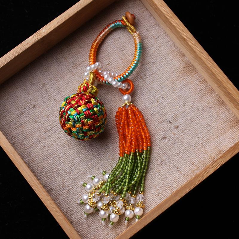 Number 16 Handmade Tassel Accessory with Ball Charm, Pearl, and Spinel Details.