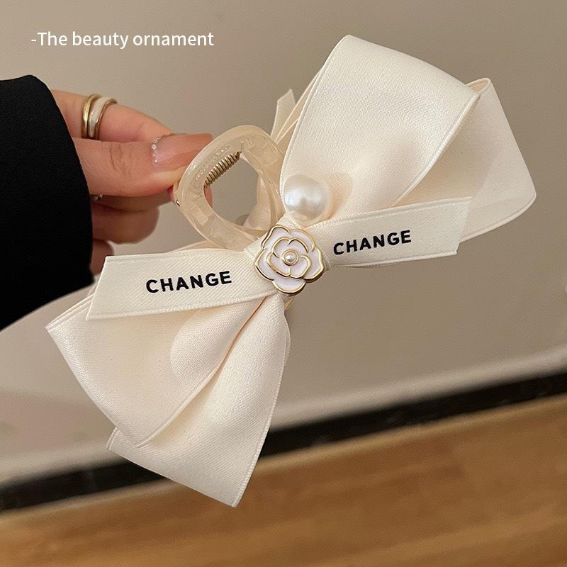

1pc chic style pearl camellia bow hair clip for women, suitable for back of head bun hairstyle, hair fixing, shark clip