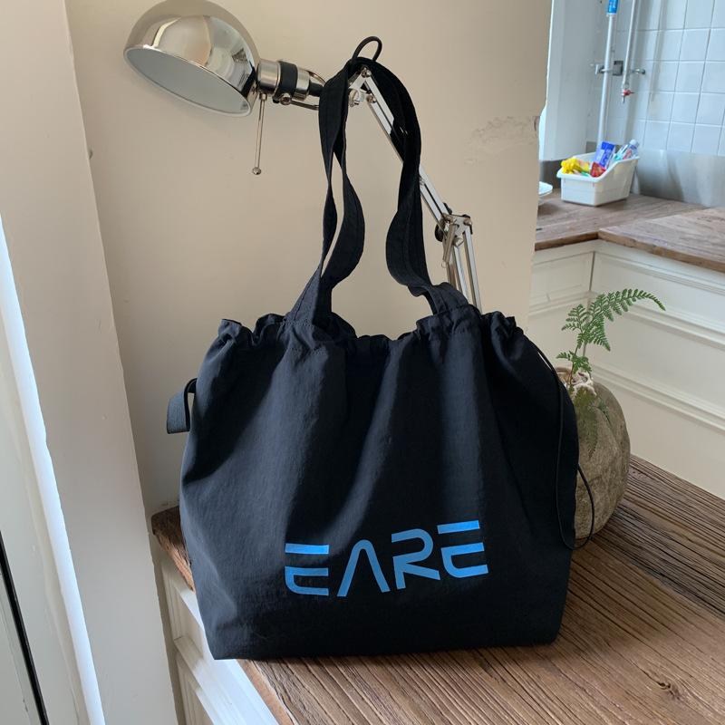 

Ленивый ветер принт на плечевой сумке конфетного цвета большая вместимость сумка-тоут женская холщовая сумка тканевая сумка сумка под мышкой