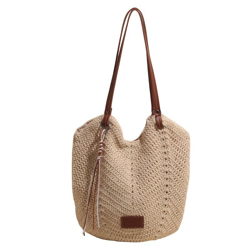 Niche portable woven tote bag women's new summer casual rope weaving holiday style trend shoulder bag