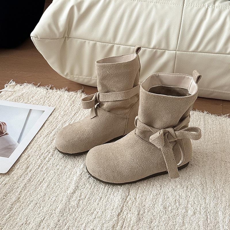 Fashion retro style bow short boots women's autumn and winter design sense lace-up single boots with skirt solid color Martin boots