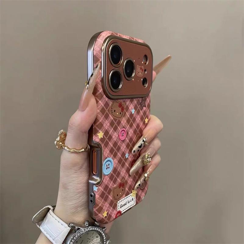 Plaid KT cat is suitable for iPhone17pro mobile phone case, Apple 16pro, large window 15pro, lattice 14pro