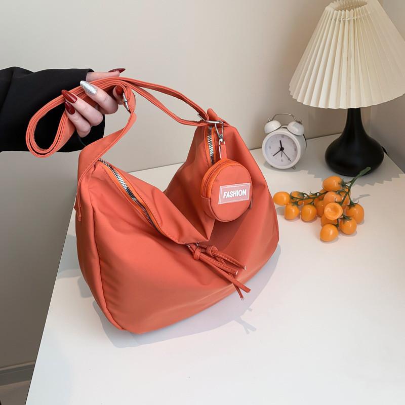 Elegant And Spacious Nylon Tote Bag For Women With Modern Aesthetic And Unique Dumpling Shape Ideal For Daily Casual Wear In 2024
