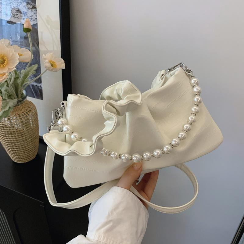 

2024 лето новый дизайн одно плечо бант молния свежий темперамент мода подмышки жемчужная цепочка сумка белый