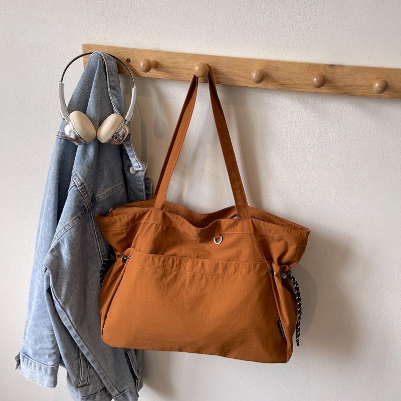 

Casual canvas tote bag commuter tote bag women s large capacity lightweight versatile popular shoulder bag коричневый