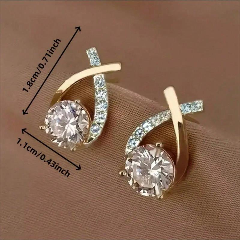 Gold Tone Teardrop Stud Earrings With Criss-Cross Cubic Zirconia Accents, Elegant Round-Cut Center Stone For Maximum Sparkle Comfortable Design