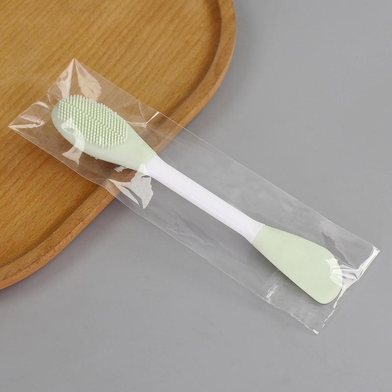 

Двусторонняя силиконовая щетка для лица Slavic Skin Care, инструмент для массажа и очищения, аппликатор для спа-масок из глины зелёный