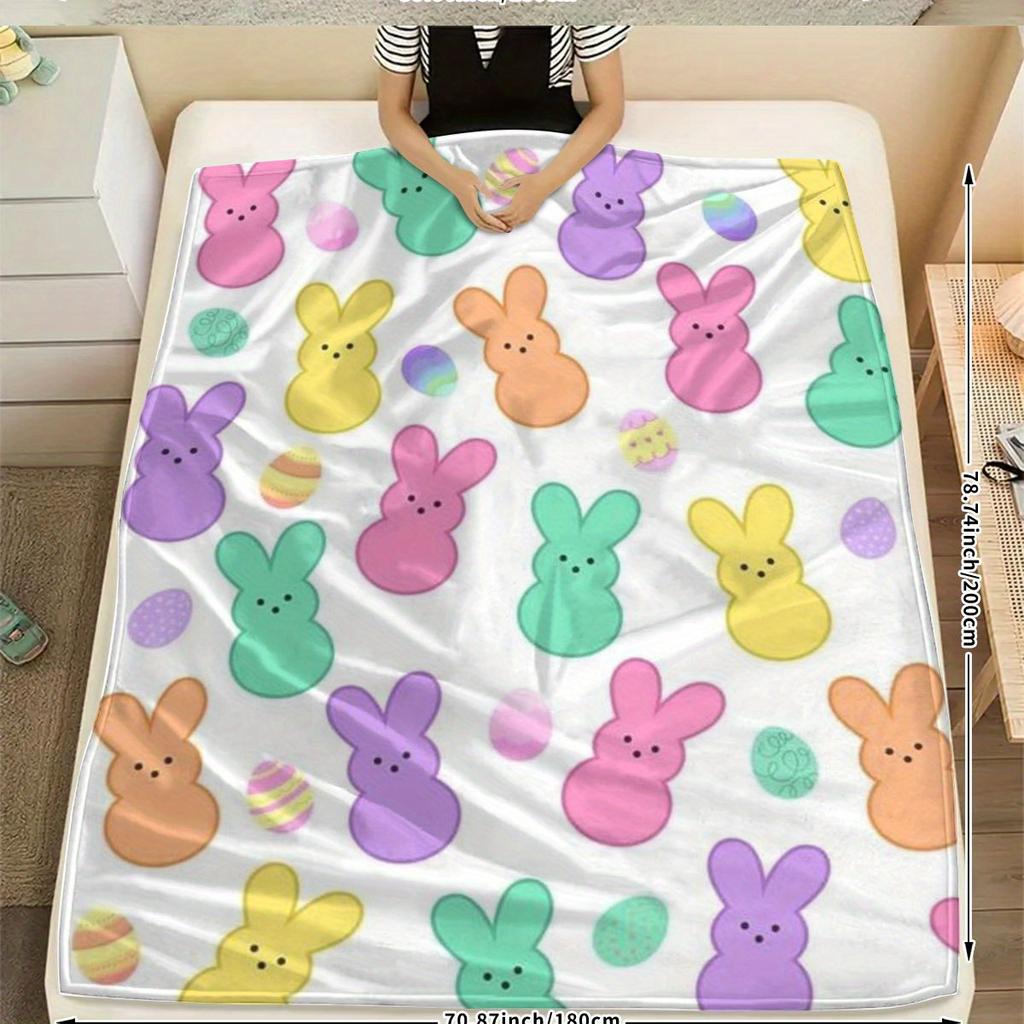 A Colorful Easter Bunny Printed Fleece Blanket That Is Soft, Comfortable, And Warm. It'S The Perfect Holiday Or Birthday Gift