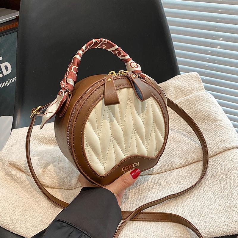 Französische Nischen-High-End-Handtasche für Damen, neue Herbst-/Wintermode, vielseitige kleine runde Tasche, beliebte Umhängetasche