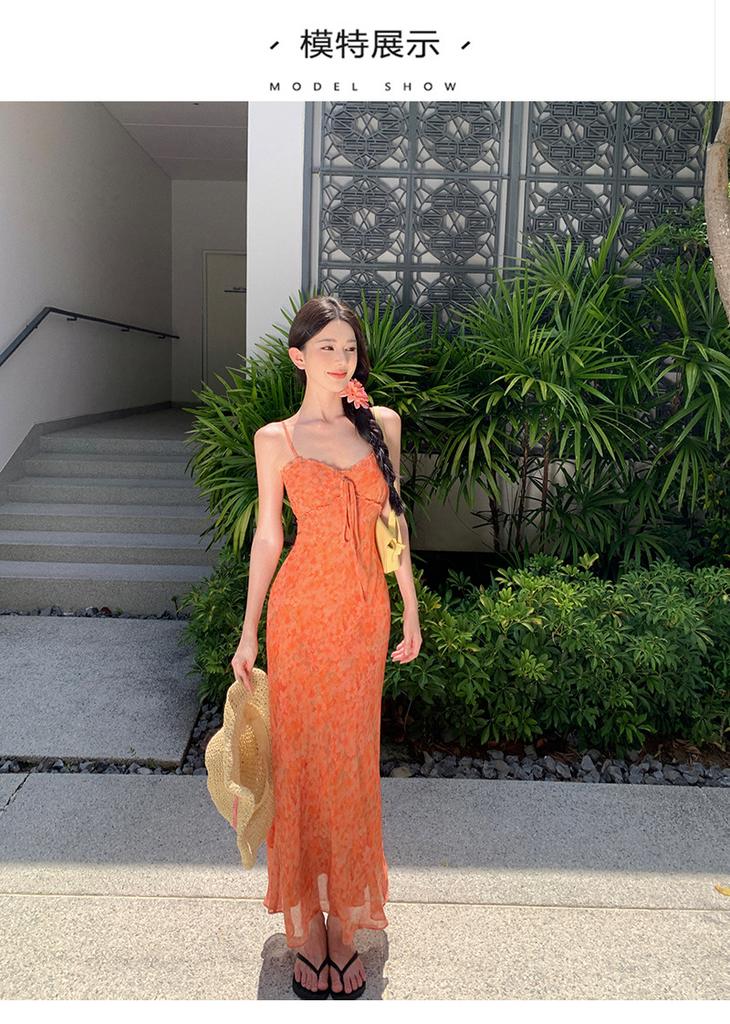 The Real Shot of the New Floral Vacation Dress Closes the Waist and Shows White and Orange Suspender Skirt.
