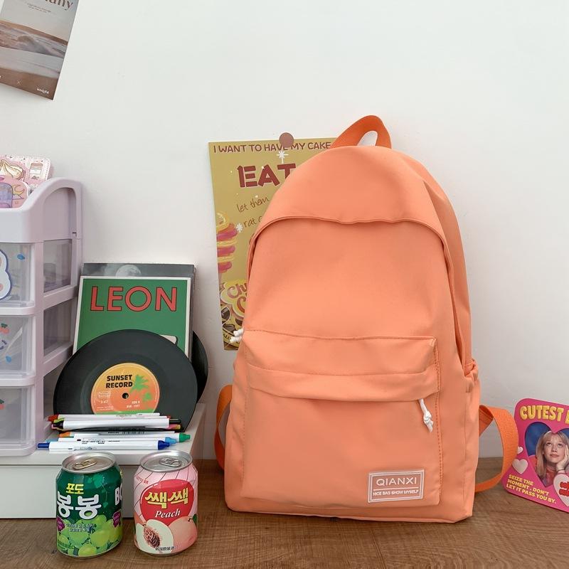 

Универсальный школьный рюкзак для девочки новый простой рюкзак для средней школы студенческий рюкзак большой вместимости оранжевый