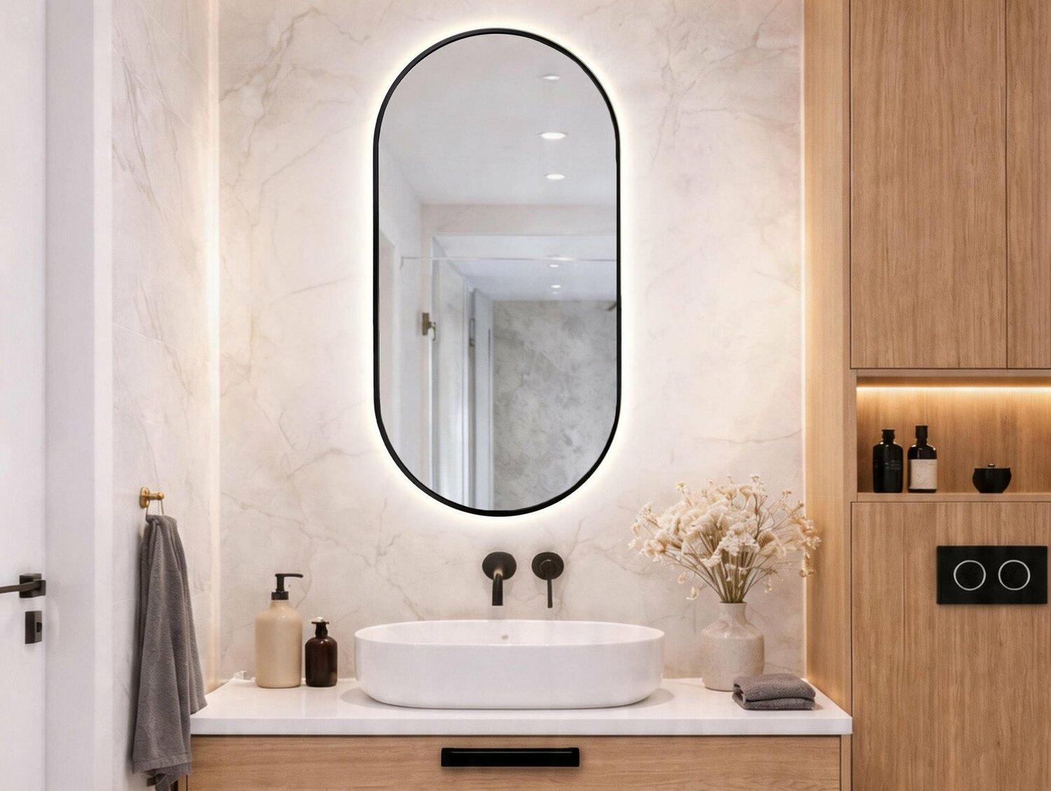 Oval mirror in a black aluminum