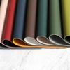 Litschi-Muster Leder-Platzset wasserdicht und ölabweisend westliches Essgeschirr-Matte Anti-Verbrühungs- und Wärmeisolations-Matte Premium-Esstisch-Matte