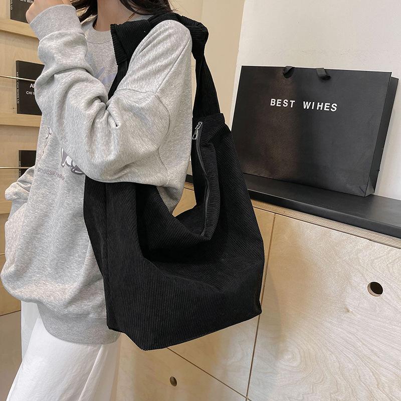 

Women s bag corduroy new shoulder bag simple large capacity bucket bag bag bag чорний