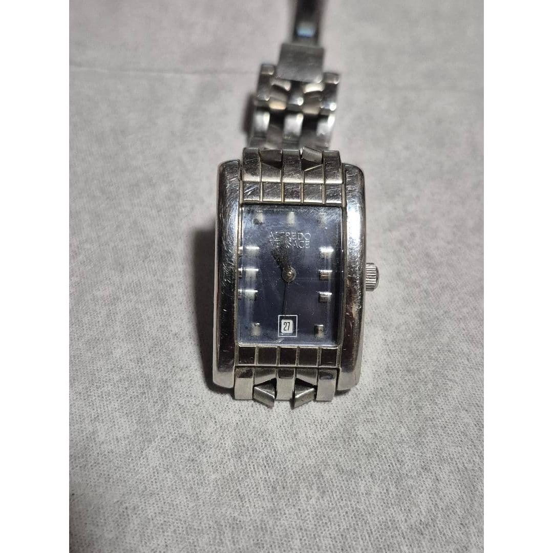 Used ALFREDO VERSACE watch quartz silver color
