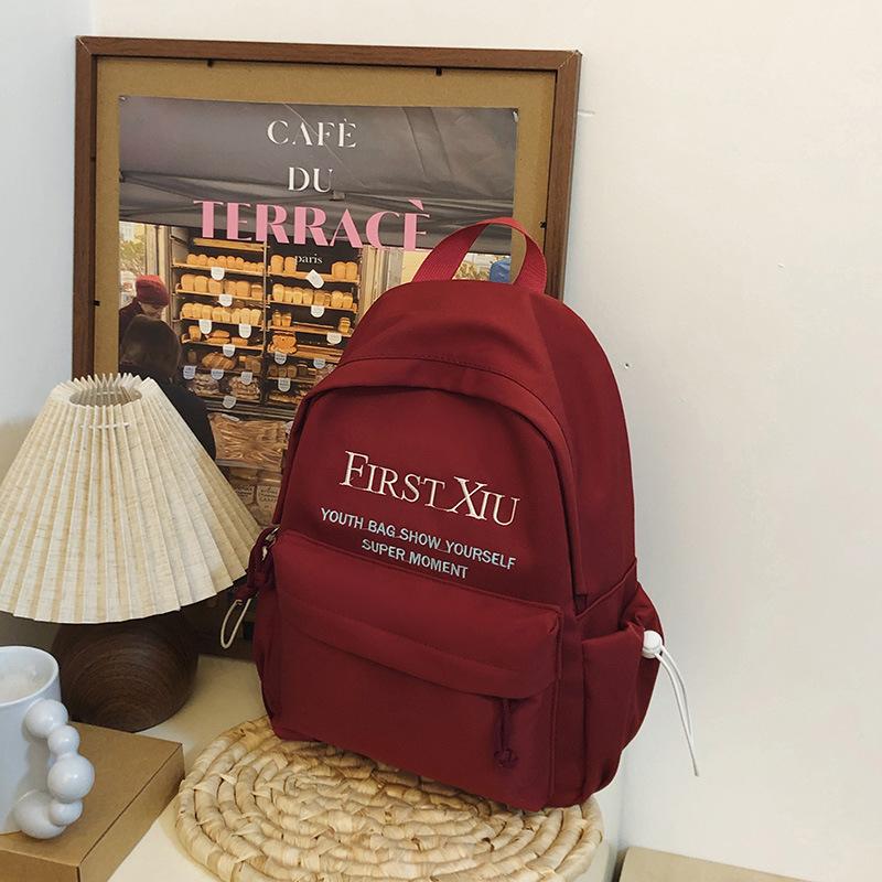 School bag Korean version ins style versatile junior high school student school bag solid color letter backpack high value simple lightweight backpack
