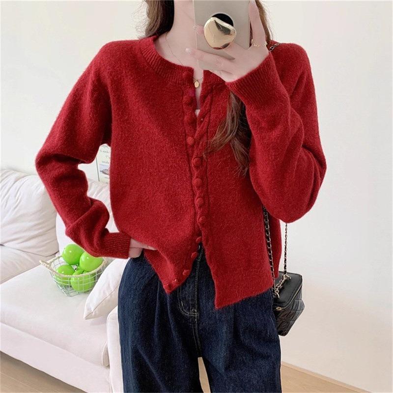 Autumn new solid color round neck single-breasted splicing long-sleeved knitted sweater women's fashion age-reducing top