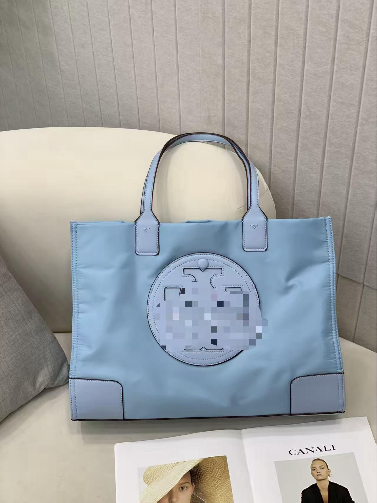 

Women s Large Capacity Nylon Canvas Tote Bag with Magnetic Buckle 34x10x25 cm небо синє кольору