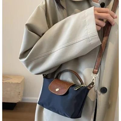 Feminine Schultertasche aus Muscheln Luxustaschen und Geldbörsen Designer Umhängetasche Hübsche kleine Tasche Hohe Qualität
