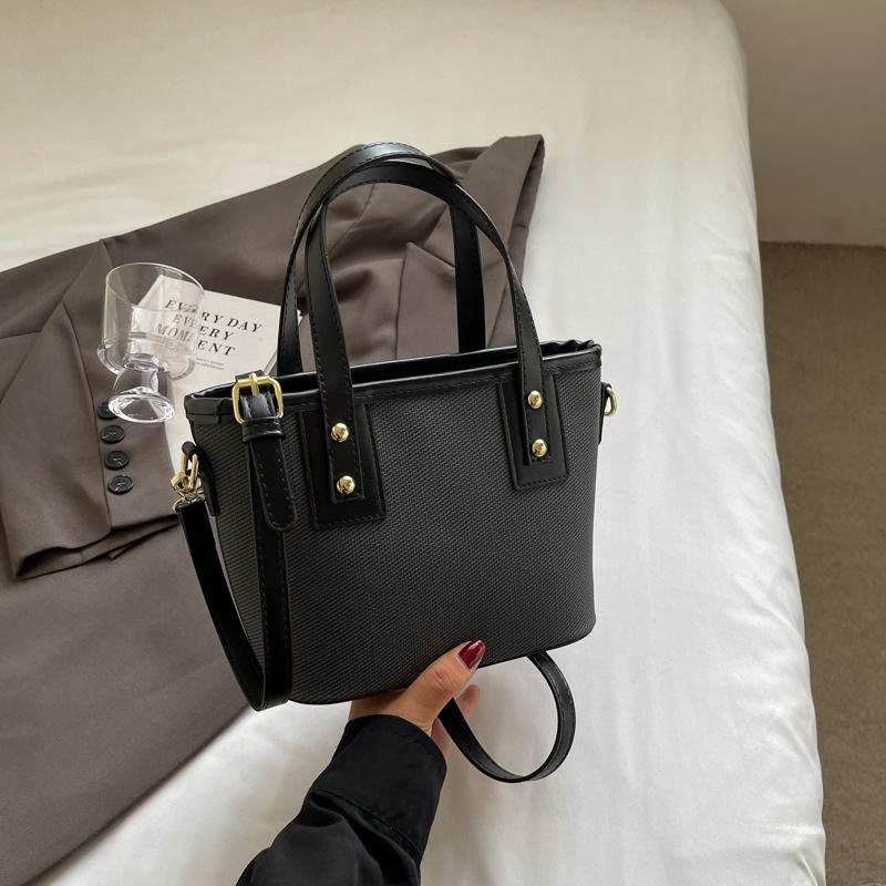 Autumn new fashionable and simple contrasting color vegetable basket bag portable shoulder oblique span trendy women's bag