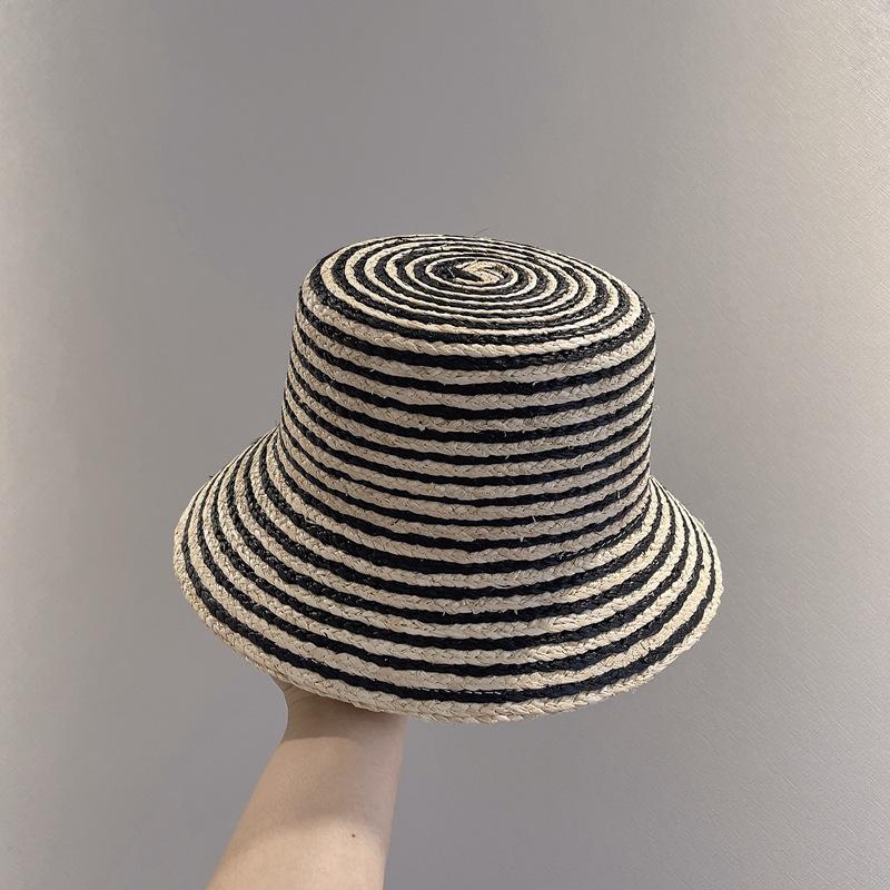 

202506-2508751 striped ins chic summer natural raffia grass weave sun protection holiday bucket cap men women leisure hat head size 57cm чорний