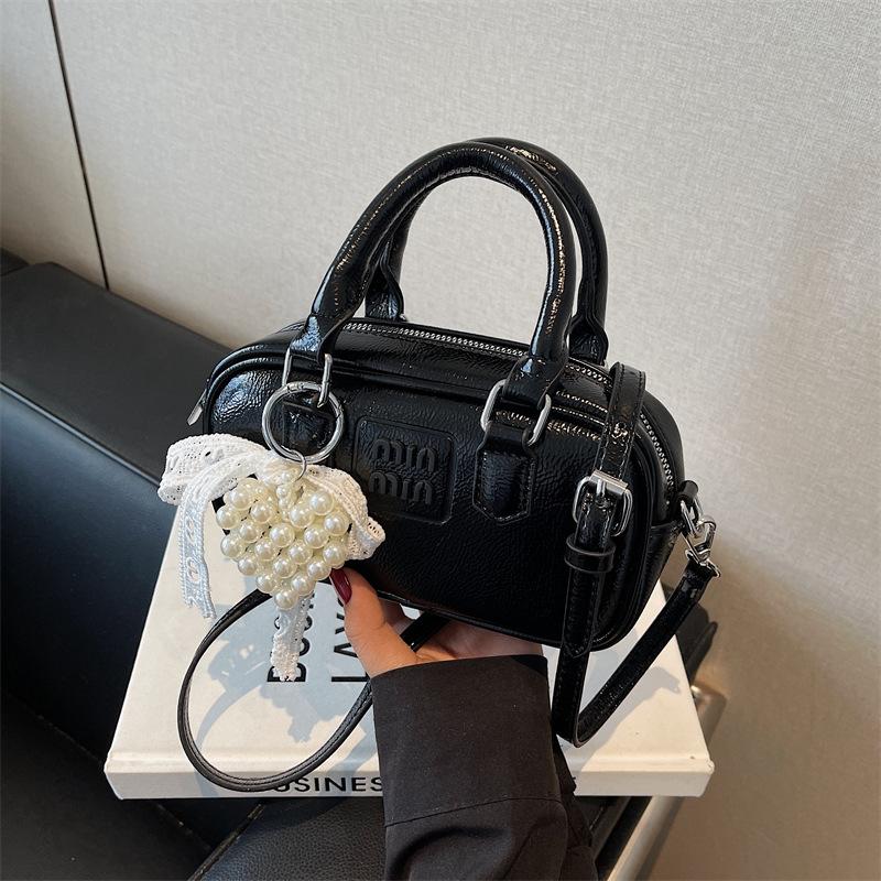 Niche casual messenger bag new fashion shoulder bag feeling hand carry bowling women's bag handbag bag