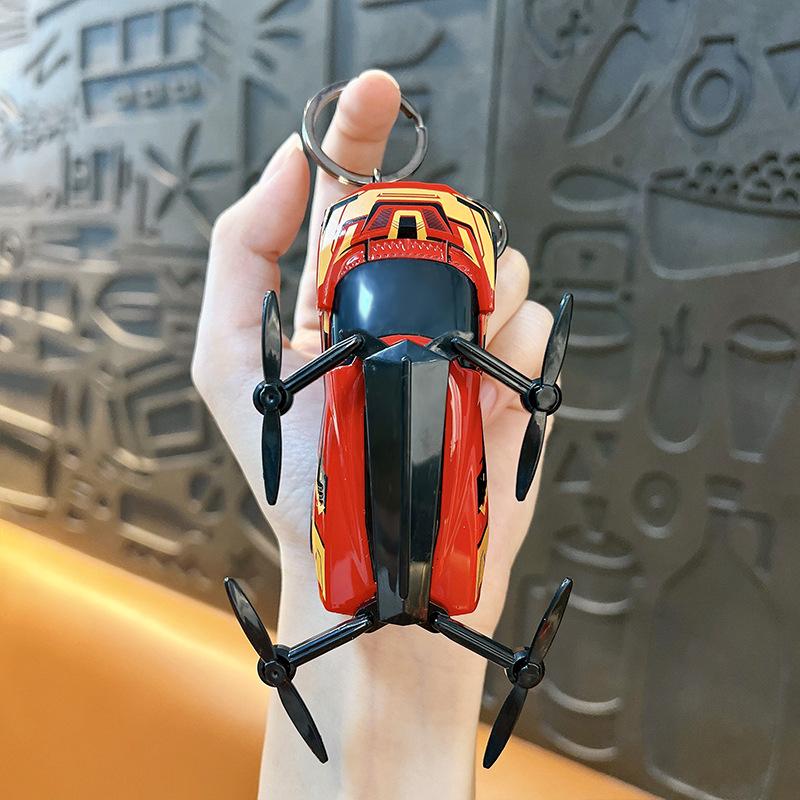 

Creative New Popularity Low - Air Flying Car Model Keychain Pendant Fun Student Toy Simulation New Energy Flying Car Toys красный