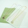 Four-Leaf Clover Pendant Necklace with Mother-of-Pearl and Agate On a Double-Sided Clavicle Chain