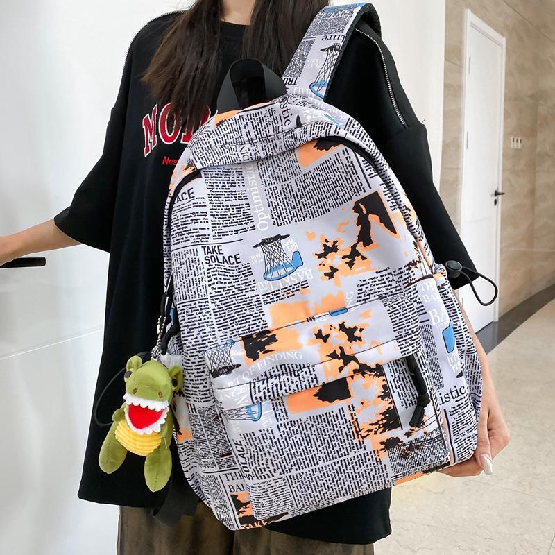 Autumn nylon backpack 2025 new Korean version fashion graffiti backpack large capacity high school student schoolbag tide