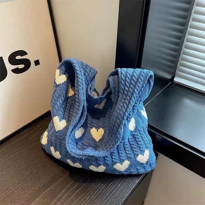 Summer super fire woven bag women's new literary and artistic style wool knitted vacation beach bag shoulder messenger bag