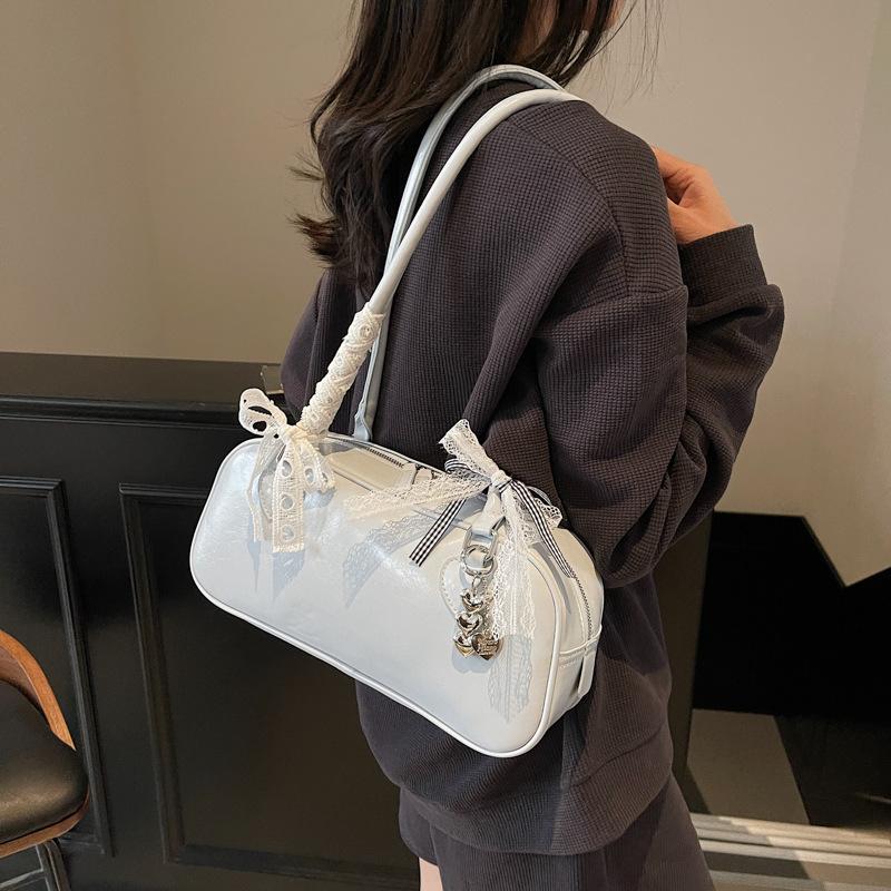 Premium texture French niche trend bow silk scarf underarm bag women's versatile simple foreign style baguette shoulder bag