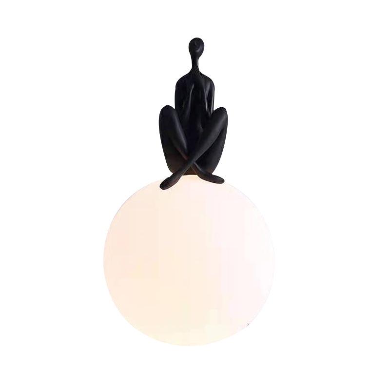 Modern Nordic Table Lamp Sculpture: Creative Doll Holding Luminous Ball for Bedroom and Living Room Decor