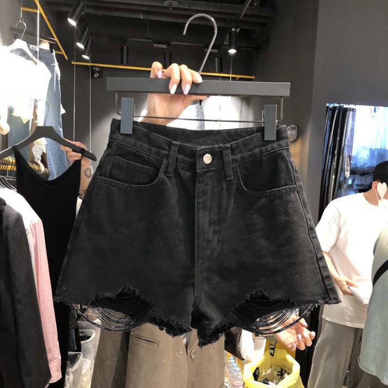 Pantaloncini di jeans strappati da donna taglie forti - Stile a trapezio ampio e sfilacciato