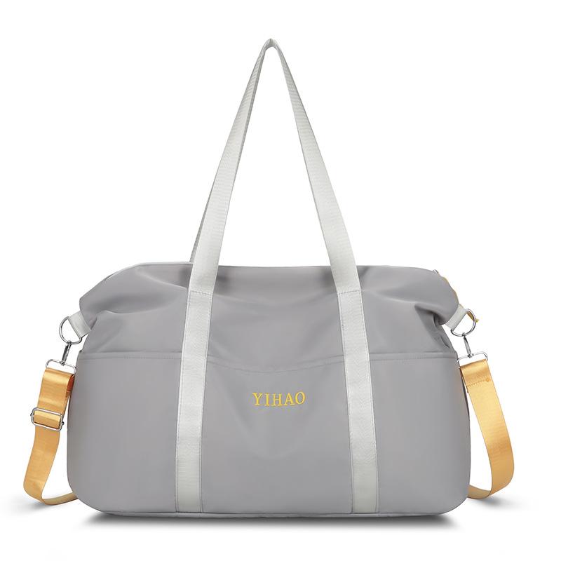 Short outing luggage bag simple leisure hand-held travel bag fashion sports training can set tie rod fitness bag