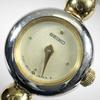 Used [Working Item, New Battery Replaced] SEIKO 1E20-0520 Dove Bracelet Round Watch Gold Dial Combi Ladies
