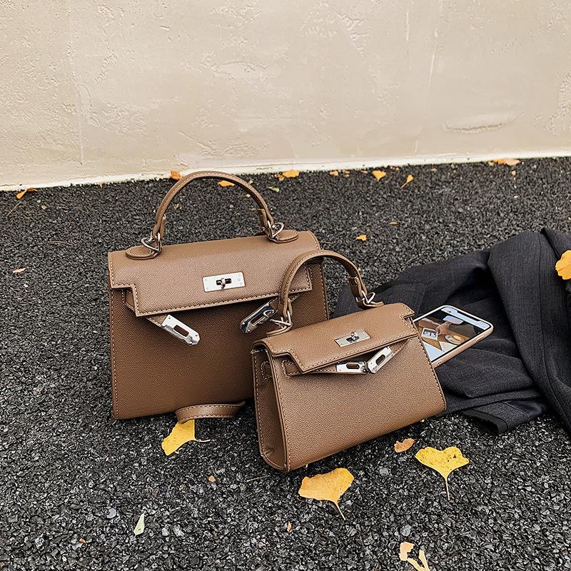 

2025 autumn new handbag fashionable simple light luxury niche Kelly bag trendy simple shoulder messenger bag Small two shoulder straps