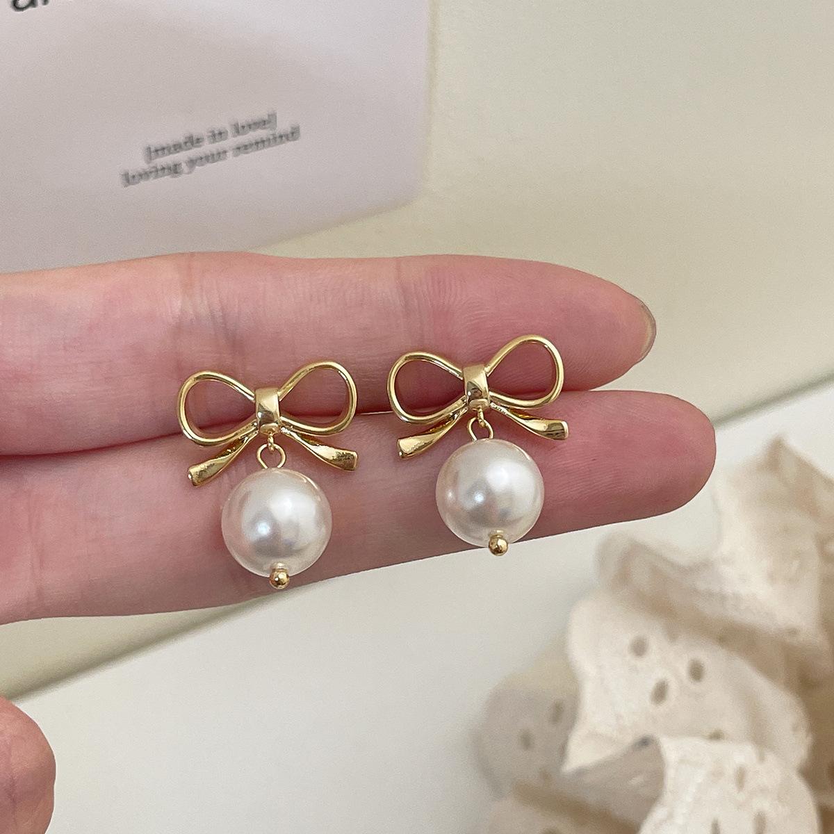 

925 Silver Needle Bow Earrings Women s Exquisite Sweet Pearl Pendant Earrings Niche Premium Earrings 925 silver needle