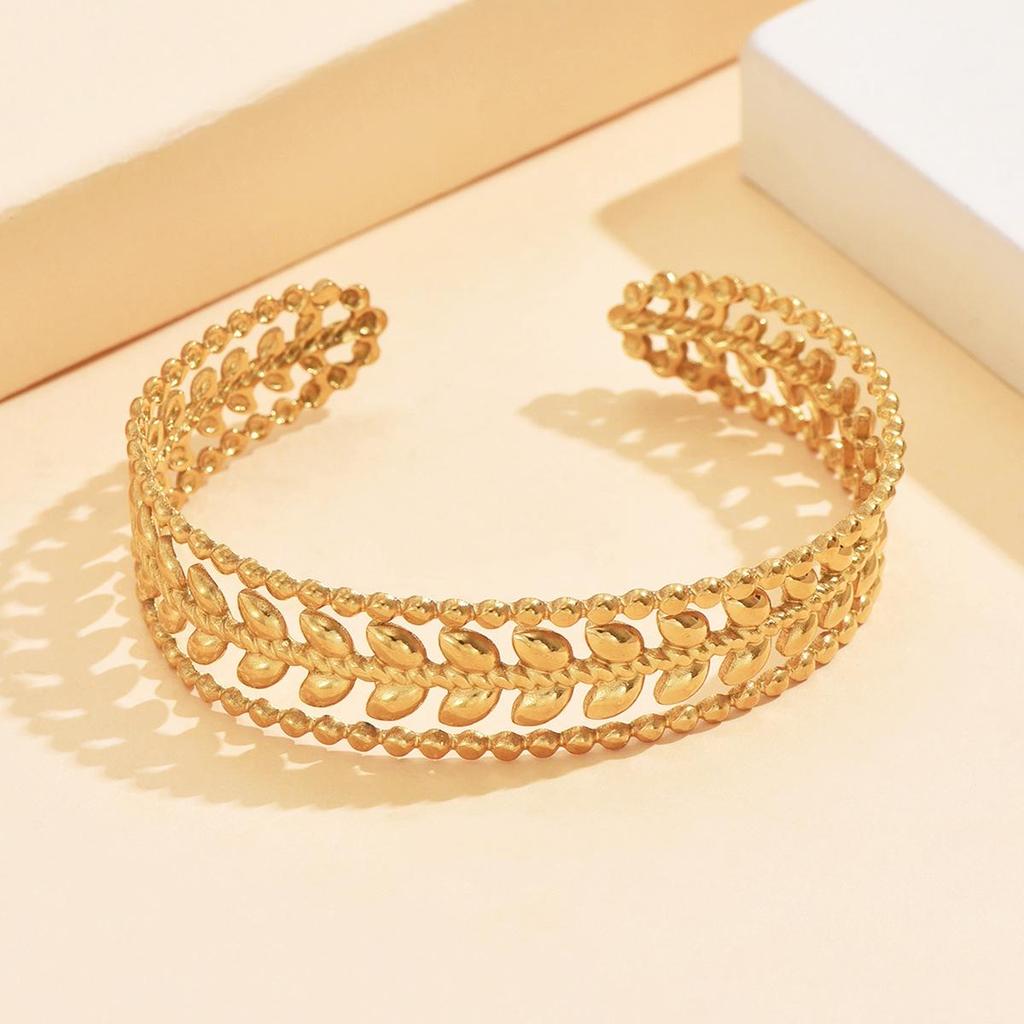 Elegant Hollow Leaf Open Stainless Steel Women's Bracelet with 18K Gold Vacuum Plating