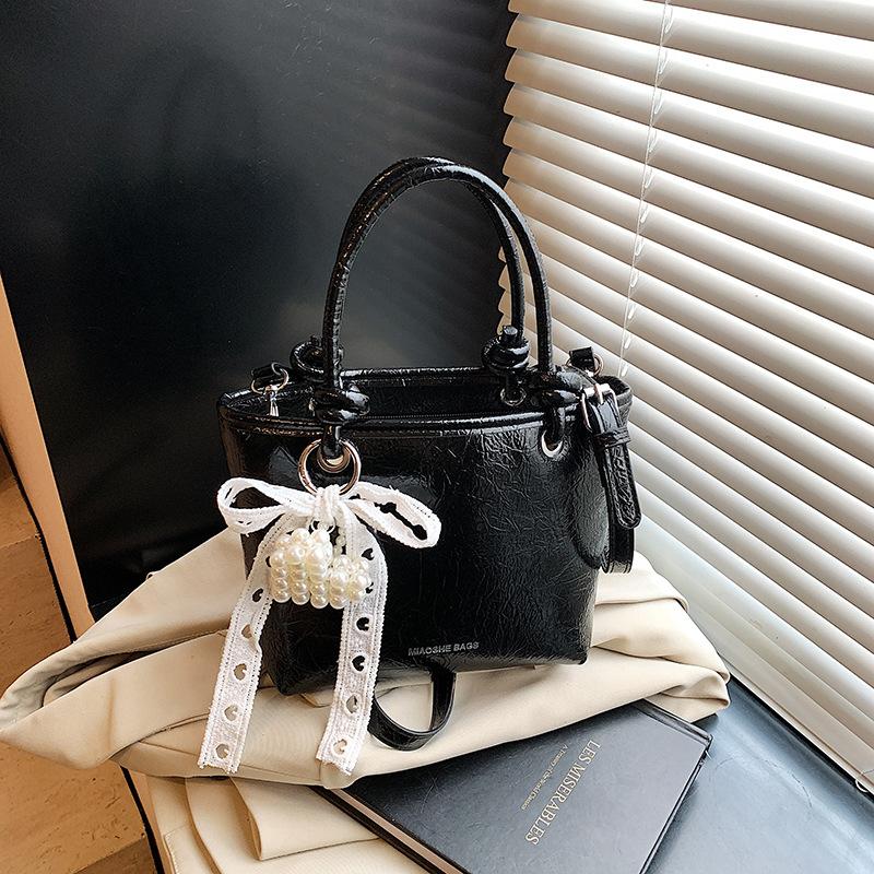 Beliebte kleine Taschen Damen Frühling und Sommer 2025 Neue Umhängetaschen Modische tragbare Beuteltaschen