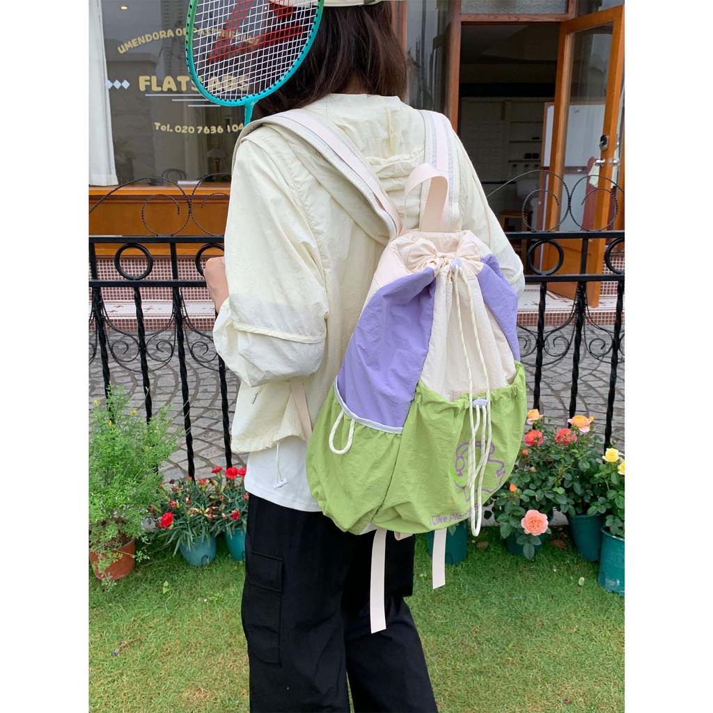 Outdoor hiking, drawstring drawstring drawstring, color blocking, casual outing, lightweight backpack, high aesthetics badmint
