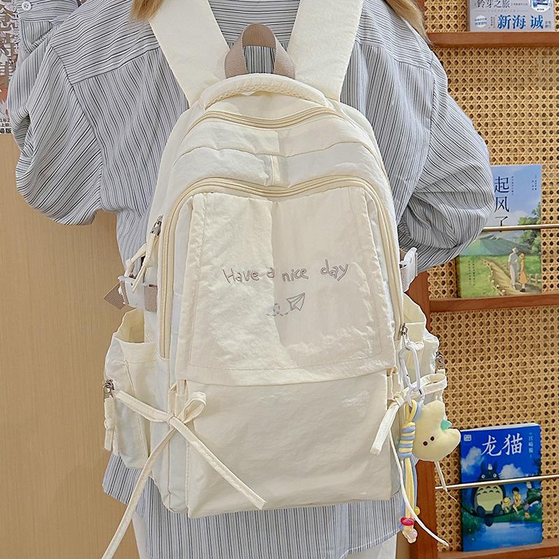 Korean backpack women's new simple and sweet large-capacity computer backpack lightweight junior high school backpack tide