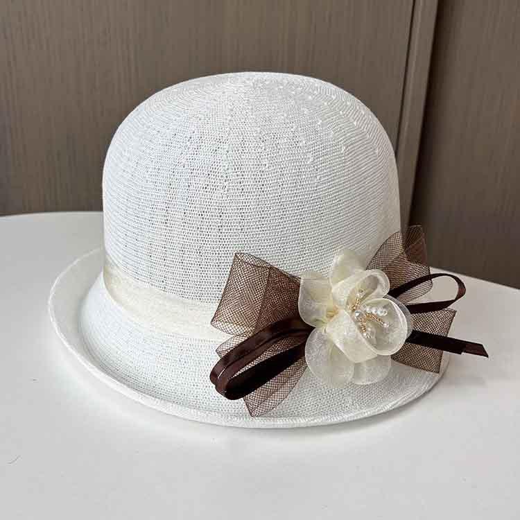 Summer new flower knitted basin hat women's face small curling edge fashion sun hat French sunscreen top hat