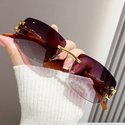 New Fashion Rimless Cut Edge Sunglasses For Men And Women Personality Leopard Mirror Leg Sunglasses