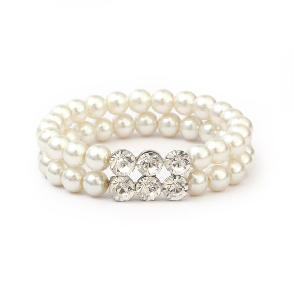 

Elegant Pearl Jewelry Set: Necklace, Earrings, and Bracelet for Women