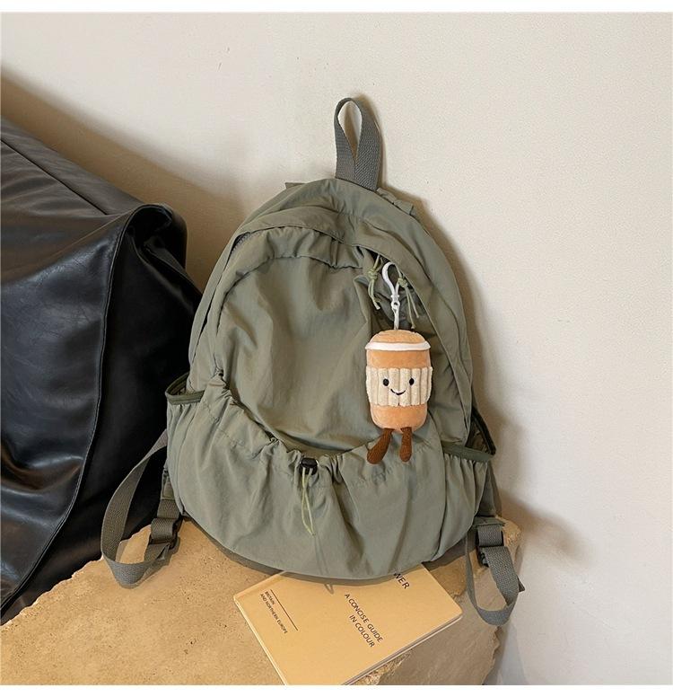 Fashionable pleated nylon backpack for women niche and trendy large-capacity flip-top student backpack schoolbag for girls