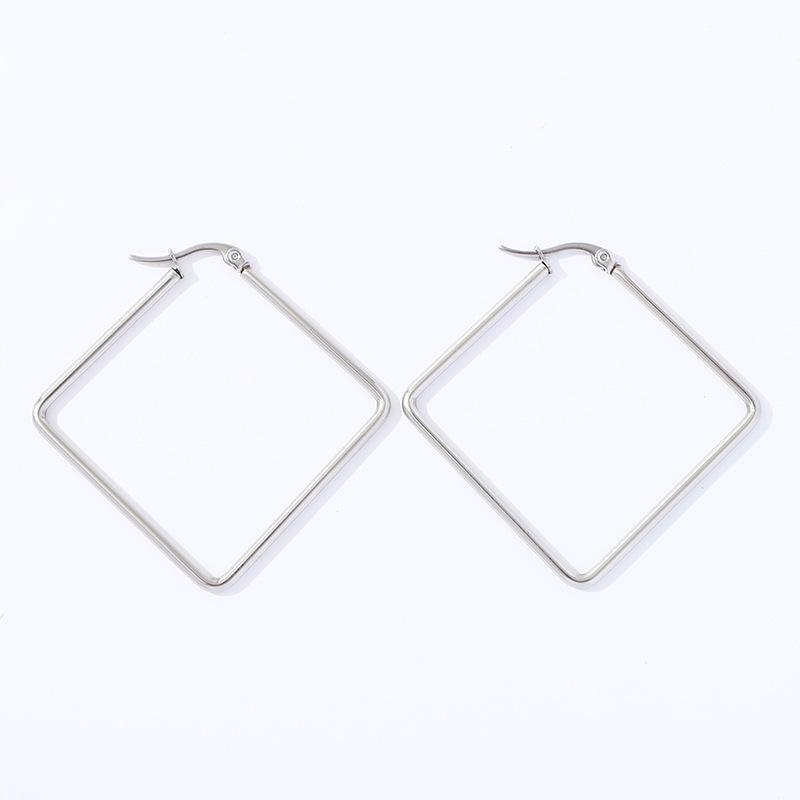 Pendientes de aro geométricos de acero inoxidable dorado con estrella de cinco puntas