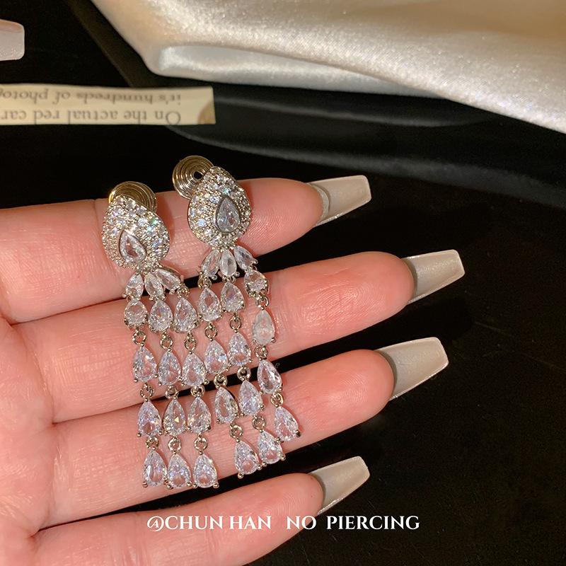

Premium ear clips without ear holes~ Crown water drop micro-inlaid zircon stud earrings Heavy Industry light luxury fringed earrings for women