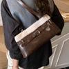 Lamb wool splicing shoulder bag women's 2025 autumn and winter new women's versatile commuter niche baguette armpit bag