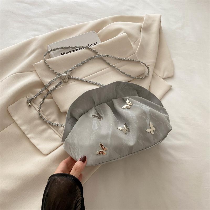 

Simple and fashionable large-capacity bucket bag for women 2024 summer new niche design commuter shoulder messenger bag for women срібний