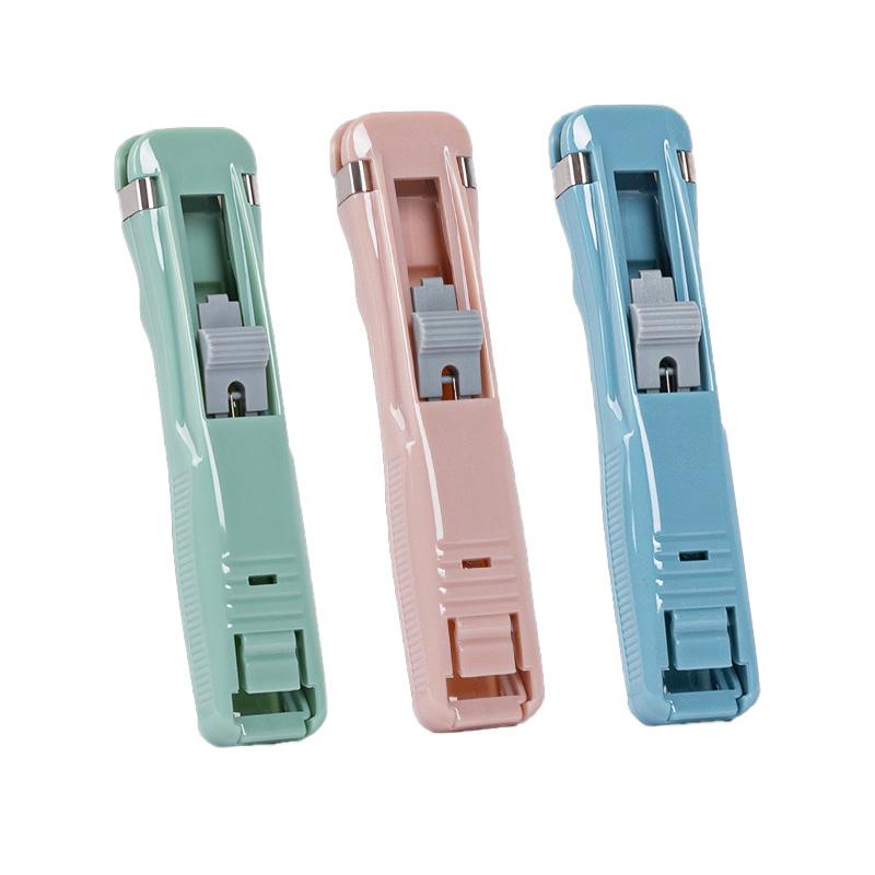 1PC Mini plastové školní potřeby Ruční sponkové vázací nástroje Tlačná sešívačka na dokumenty